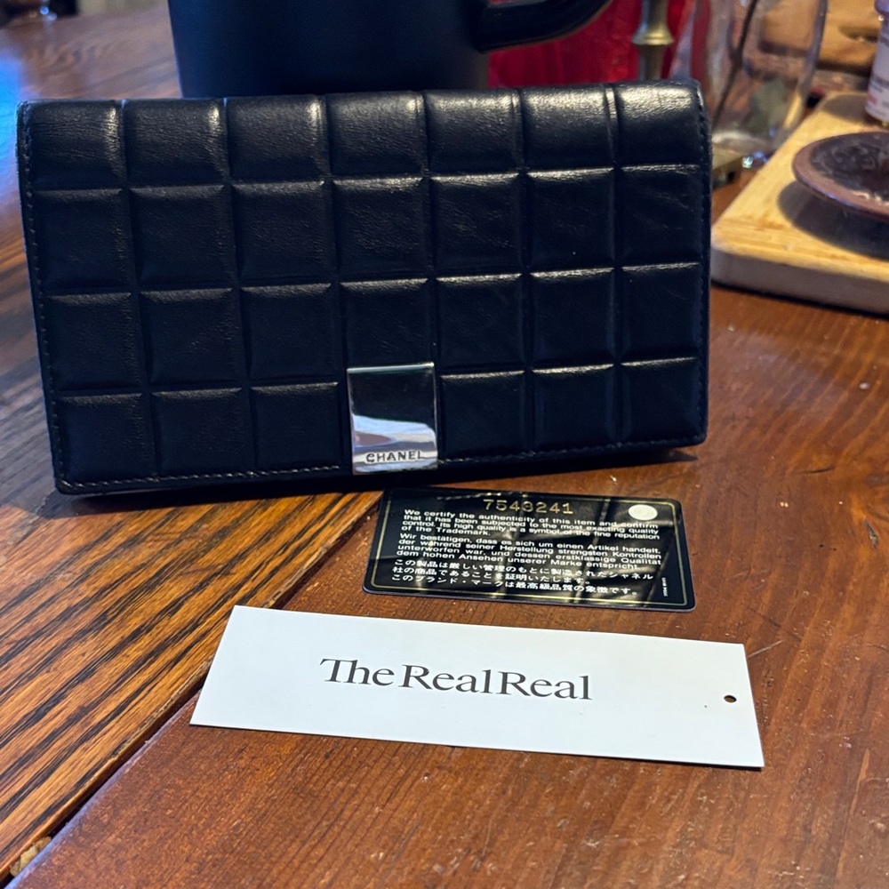 CHANEL Black Quilted Leather Bifold Wallet with Silver Logo Clasp